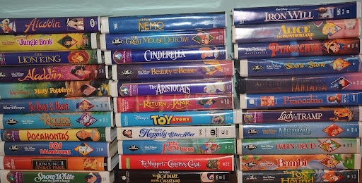 stacks of walt disney movies on VHS tape